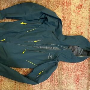 Arc'teryx Men's Teal Performance Jacket with Yellow Accents
